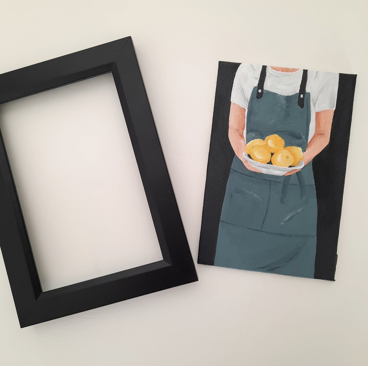 Chef Holding a Plate of Lemons
