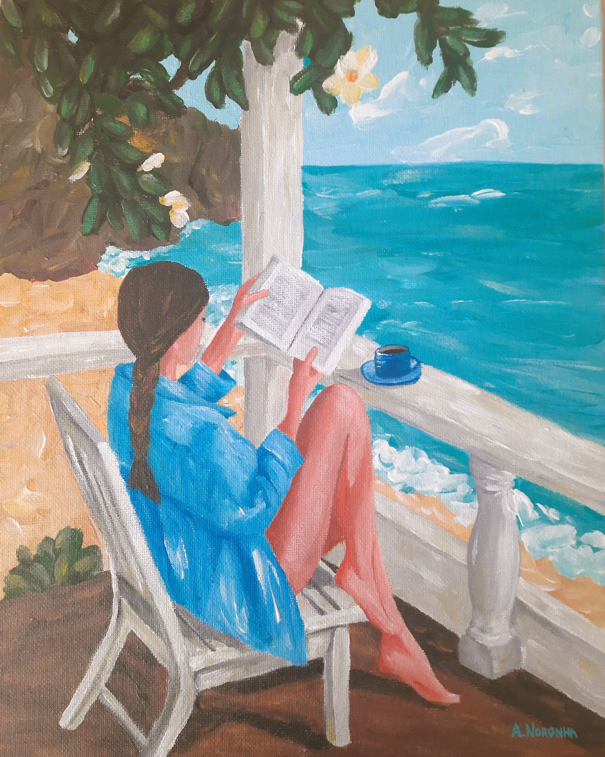 Close-up of an acrylic painting showing a woman in a blue shirt sitting on a white chair, reading a book on a balcony overlooking a turquoise ocean with white flowers framing the top.